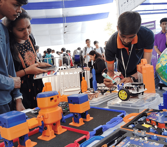 Students exploring AI & Robotics kits